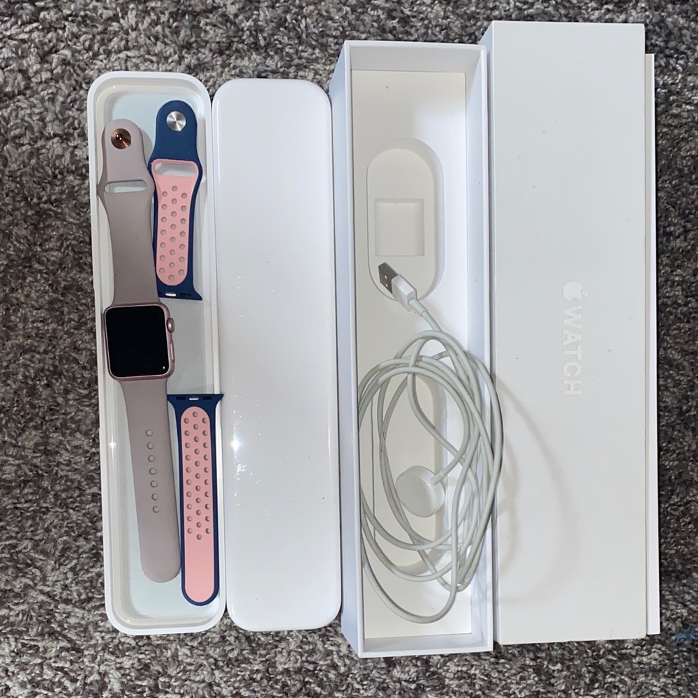 Apple Watch with Pink and Blue Accents